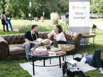 A group of people sitting on a couch in a park.
(Microsoft Story Lounge,woman, people, man, sit, relaxation, family, summer, togetherness, leisure, adult, girl, love, furniture, picnic, couple, grass, nature, garden, fun, recreation)