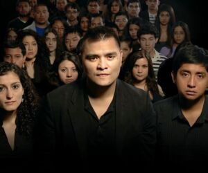 A group of students stand in a row and look at the camera.
(portrait, model, group, people, girl, woman, man, fashion, festival, adult, movie, wear, actress, theater, concert, indoors, stage, performance, group together, son)