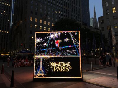 The lighting of the christmas tree.
(PRIMETIME IN PARIS,street, light, city, travel, urban, people, Broadway, neon, education, Christmas, road, festival, business, school, billboard, landscape, celebration, building, shopping, university)