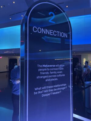 The signage at the entrance.
(CONNECTION The Metaverse will allow people to connect with friends,family,even strangers across cultures and places.,no person, business, illuminated, travel, technology, contemporary, electronics, indoors, internet, airport, futuristic, people, security, bright, science, industry, recreation, data, facts, subway system)