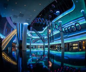 The pool area at night.
(casino, light, neon, travel, evening, gambling, hotel, business, exhilaration, city, technology, architecture, blur, nightlife, building, motion, reflection, abstraction, poker, fisheye)