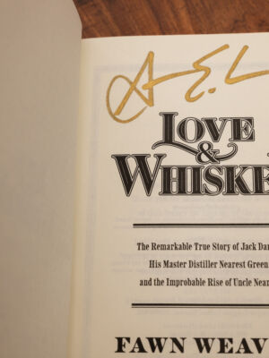 A copy of the book.
(IOVE WHUSKEY The Remarkable True Story of Jack Daniel His Master Distiller Nearest Green and the Improbable Rise of Uncle Nearest FAWNWEAVER,no person, paper, business, retro, old, writing, document, wood, text, facts, handwritten, law, information, antique, typography, vintage, spherical, banking, travel, page)